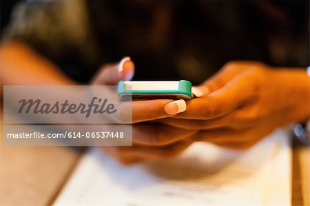 Close up of woman using cell phone