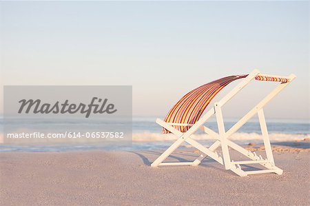 Lawn chair on empty beach