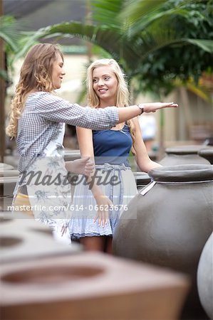 Woman shopping for planters