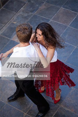 Couple dancing together outdoors