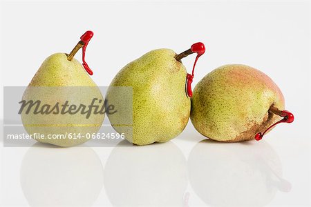 Pears with red tags on stems