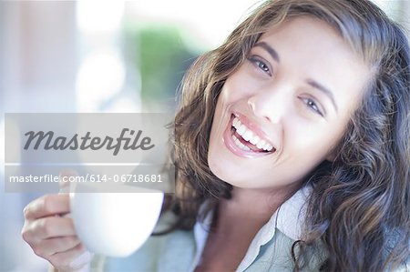 Woman having cup of coffee