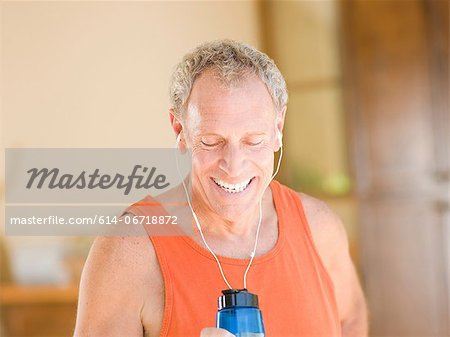 Older man working out at home