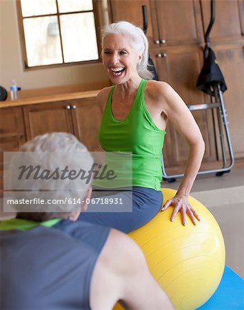 Older couple working out at home