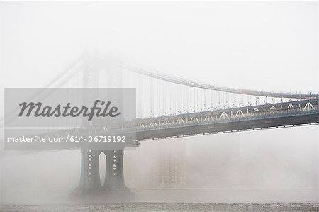 Fog rolling over bridge