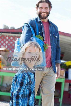 Father and son at farmer's market