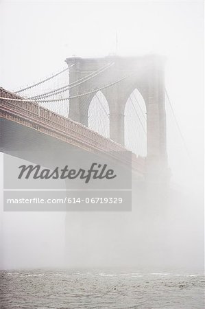 Fog rolling over Brooklyn bridge