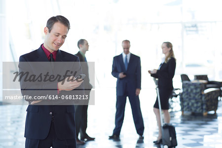 Businessman using cell phone