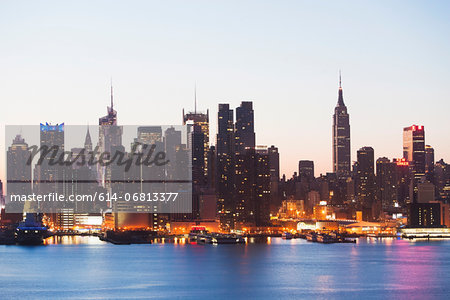 Manhattan skyline and waterfront at dusk, New York City, USA