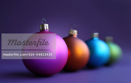 Colorful row of christmas baubles