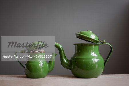 Two teapots with money inside Two teapots with money inside