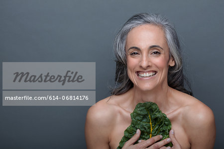 Mature woman with chard
