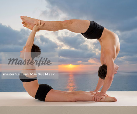 Mid adult couple performing modern dance