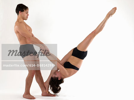 Mid adult couple performing modern dance