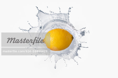 Lemon splashing in liquid