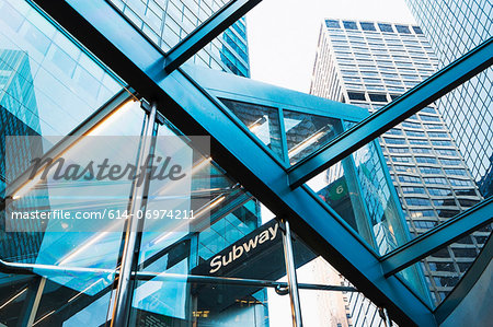 Skyscrapers through subway entrance, New York City, USA