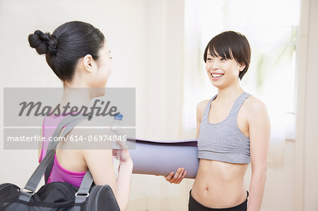 Women talking in gym