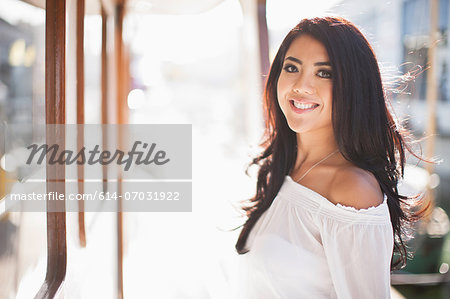 Portrait of young woman on yacht, San Francisco, California, USA