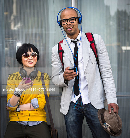 Young couple with mp3 players