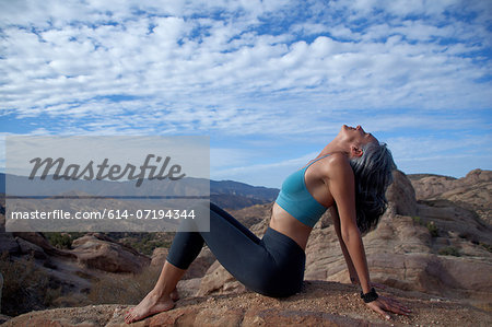 Woman sitting leaning back at Vazquez Rocks