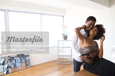 Portrait of young couple hugging