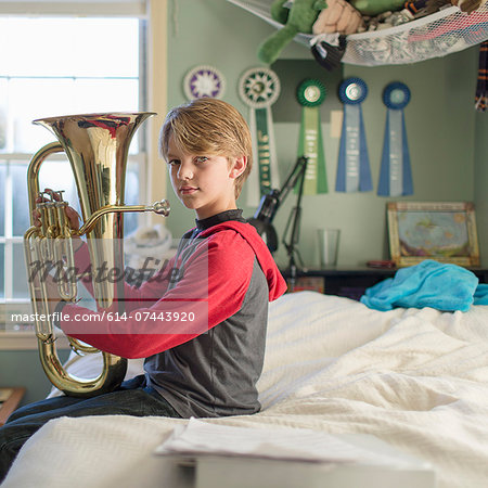 Picture person playing tuba Stock Photos - Page 1 : Masterfile