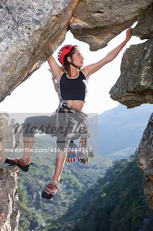 Premium Photo  Crazy climber balancing on a rock. loss of balance
