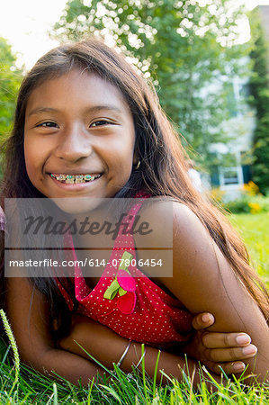 Girl lying on grass