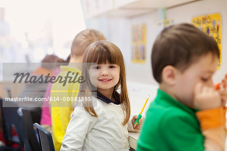 Toddlers writing in classroom Toddlers writing in classroom
