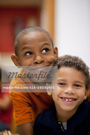 Boys smiling in classroom