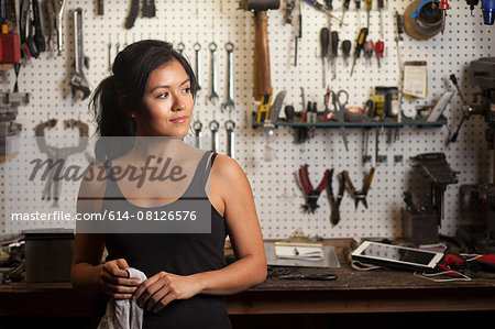 Female mechanic in workshop Female mechanic in workshop