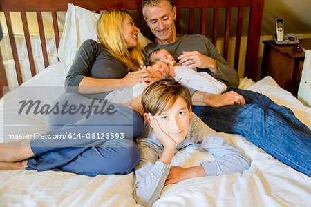 Couple with son and newborn twin girl and boy