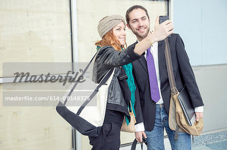 Business people taking selfie