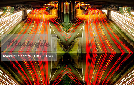 Abstract cityscape, mirror image of highway traffic light trails at night, Los Angeles, California, USA
