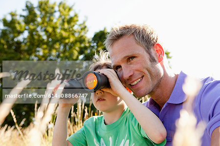 Father and Son With Binoculars