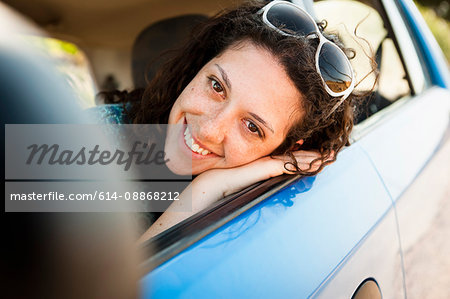 Woman smiling in car
