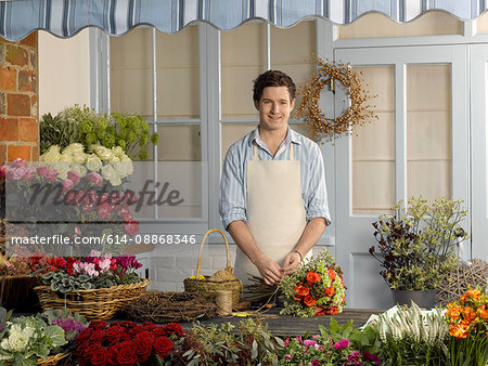 Florist arranging bouquet in shop