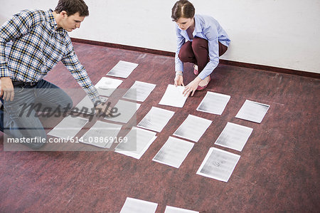 Business people organizing papers