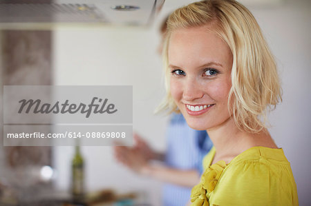 Close up of woman cooking in kitchen