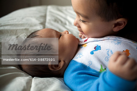 Boy with baby brother, close up