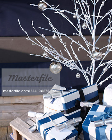 Xmas tree and parcels on sunny porch in Australia