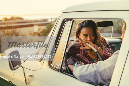 Romantic couple in pickup truck at Newport Beach, California, USA