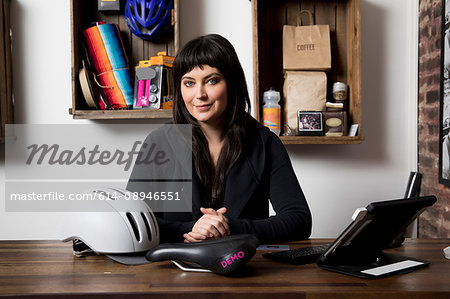 Woman in cycling accessories shop