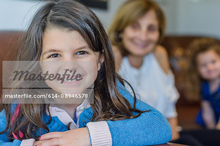 Girl with family in living room