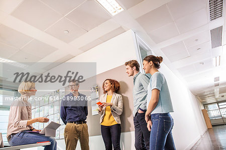 Digital design team talking in office meeting Digital design team talking in office meeting