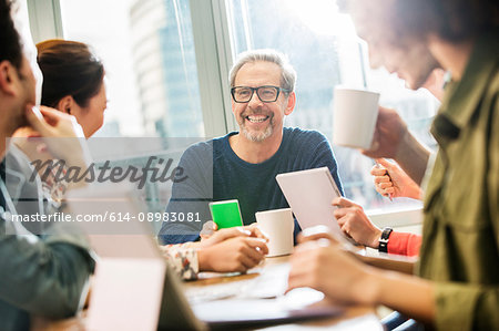 Digital design team having meeting in office Digital design team having meeting in office