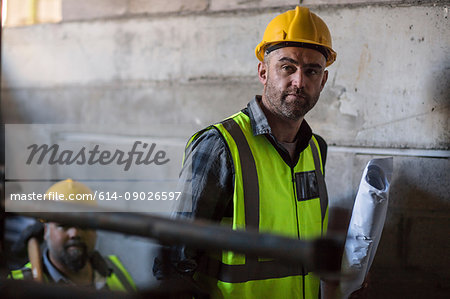 Construction workers on building site