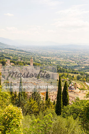 Landscape view of rooftops and Basilica of Saint Francis of Assisi, Assisi, Umbria, Italy