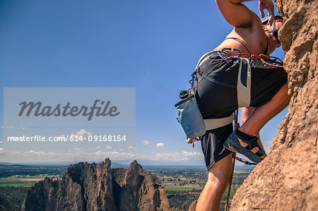 Rock climber rock climbing, Smith Rock State Park, Terrebonne, Oregon, United States