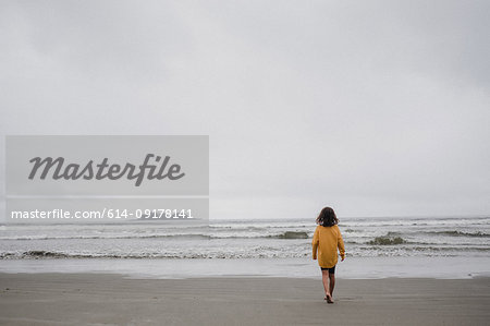 Girl on beach, Tofino, Canada